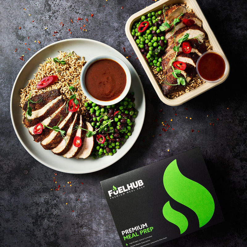 Jerk Chicken with wholegrain rice, minted peas & black beans and jerk sauce